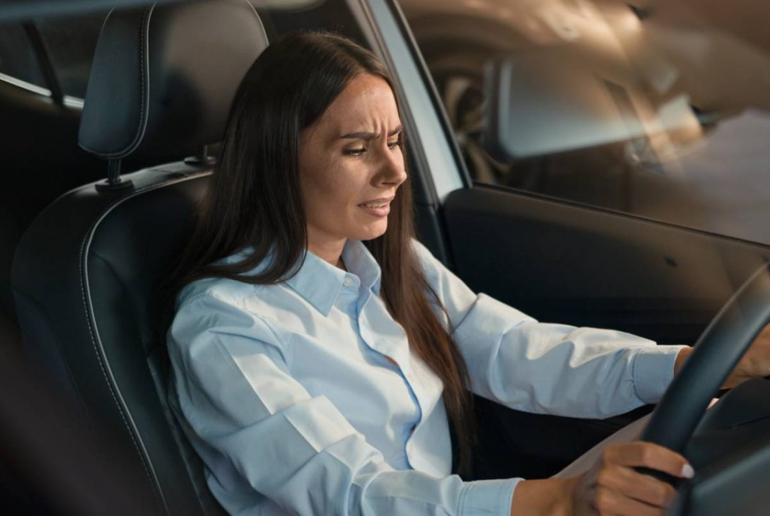 Sad upset stressed unhappy Caucasian female driver inside car in automobile woman girl lady stress anxiety worried depression despair problem trouble health failure relationship break up traffic jam. microsleep concept