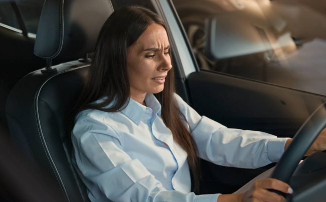 Sad upset stressed unhappy Caucasian female driver inside car in automobile woman girl lady stress anxiety worried depression despair problem trouble health failure relationship break up traffic jam. microsleep concept